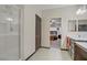 Bright bathroom with walk-in shower and doorway to main bedroom at 961 Cutter St, Henderson, NV 89011