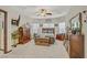 Spacious main bedroom featuring a ceiling fan, multiple windows, and neutral carpeting at 961 Cutter St, Henderson, NV 89011