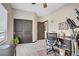 Bright office with carpeted floors, ceiling fan, window, and a spacious work area at 961 Cutter St, Henderson, NV 89011