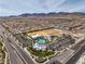 Community aerial image featuring a large recreation center, pool and playground with spacious parking at 9655 Shadow Cliff Ave, Las Vegas, NV 89166