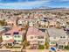 Overhead scene of homes with patios, green lawns, and potential pool setups, perfect for outdoor living at 9655 Shadow Cliff Ave, Las Vegas, NV 89166