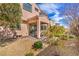 Backyard featuring a covered patio and desert landscaping at 9655 Shadow Cliff Ave, Las Vegas, NV 89166