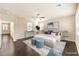 Stylish main bedroom with modern decor, wood floors, and plenty of natural light at 9655 Shadow Cliff Ave, Las Vegas, NV 89166