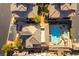 A high angle of a community pool and patio for residents to use with nearby parking at 9986 Sand Key St, Las Vegas, NV 89178