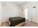 Bedroom featuring plush carpeting and a door leading to the outdoor space at 9986 Sand Key St, Las Vegas, NV 89178