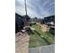 Backyard shows grass, tools and equipment. It needs cleaning at , Las Vegas, NV 89104