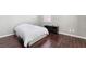 Bedroom with plank flooring and a cozy atmosphere at 10259 Wolves Den Ln, Las Vegas, NV 89178