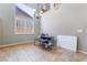 Dining room with natural light, tile floors, high ceilings and views of the second floor at 10259 Wolves Den Ln, Las Vegas, NV 89178