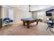 Bright game room with a pool table at 10259 Wolves Den Ln, Las Vegas, NV 89178