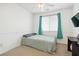 Bedroom featuring carpet floors, a ceiling fan, neutral walls, and a small window at 1121 Via Castelli, Henderson, NV 89052