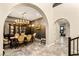 Elegant dining room boasting a large hutch, decorative walls, and adjacent sitting room at 1200 Dry Point Ct, Las Vegas, NV 89144