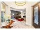 Elegant foyer with travertine flooring, modern lighting, and stylish decor at 1200 Dry Point Ct, Las Vegas, NV 89144