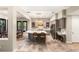 Spacious kitchen featuring an island with seating, stainless appliances, and stylish cabinets at 1200 Dry Point Ct, Las Vegas, NV 89144