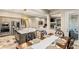 Bright kitchen area with island seating, stainless appliances, and an open floor plan at 1200 Dry Point Ct, Las Vegas, NV 89144
