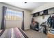 Bedroom with carpeted floor, a window, and closet space for storage at 1534 Irene Dr, Boulder City, NV 89005