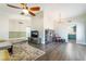 Open living room with a large picture window, and stylish chandelier at 1534 Irene Dr, Boulder City, NV 89005