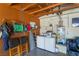 Functional utility area with washer, dryer, storage, and essential household equipment at 1534 Irene Dr, Boulder City, NV 89005