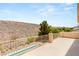 Spacious outdoor balcony with desert views and a pool down below at 17 Morninglow Pass, Henderson, NV 89052