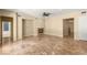 An open-concept living area with a fireplace and marble flooring at 17 Morninglow Pass, Henderson, NV 89052