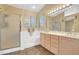 Bathroom features double sinks, a shower, and tub at 1931 Jasper Creek Pl, Las Vegas, NV 89123