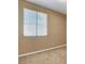 Cozy bedroom with natural light and a neutral color palette, creating a serene atmosphere at 1931 Jasper Creek Pl, Las Vegas, NV 89123