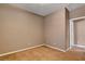 Spacious bedroom with plush carpeting and ample natural light, inviting relaxation and comfort at 1931 Jasper Creek Pl, Las Vegas, NV 89123