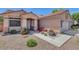Attractive one-level house featuring a landscaped front yard and a attached two-car garage at 1931 Jasper Creek Pl, Las Vegas, NV 89123