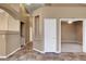 Hallway features attractive flooring and leads to additional rooms in the home at 1931 Jasper Creek Pl, Las Vegas, NV 89123