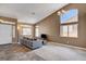 Spacious living area with a vaulted ceiling, neutral walls, and lots of natural light at 1931 Jasper Creek Pl, Las Vegas, NV 89123