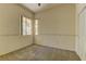 Bright bedroom featuring two corner windows and neutral carpet at 1945 Trail Peak Ln, Las Vegas, NV 89134