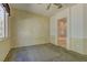 Spacious bedroom with carpet, neutral walls, and entry to the en-suite bathroom at 1945 Trail Peak Ln, Las Vegas, NV 89134