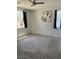Bright bedroom with neutral walls and carpet at 219 Vanhoy Ave, Henderson, NV 89011