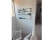 Hallway with white railing featuring beachy decor at 219 Vanhoy Ave, Henderson, NV 89011