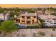 Aerial view of backyard featuring a custom pool, fire pit, and desert landscaping at 2369 Green Mountain Ct, Las Vegas, NV 89135