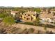 Aerial perspective of a luxury home showcasing outdoor living with a pool, landscaping and mountain views in the background at 2369 Green Mountain Ct, Las Vegas, NV 89135