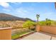 Balcony view showing palm trees and mountains at 2369 Green Mountain Ct, Las Vegas, NV 89135