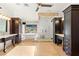 Spacious bathroom showcasing dual vanities, a soaking tub with views, and a glass-enclosed shower at 2369 Green Mountain Ct, Las Vegas, NV 89135