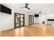 Bonus room features a mirrored wall and double doors leading to the backyard at 2369 Green Mountain Ct, Las Vegas, NV 89135