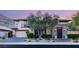 Charming two-story home featuring well-maintained landscaping and a welcoming entryway with mountain backdrop at 2369 Green Mountain Ct, Las Vegas, NV 89135