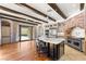 Open concept kitchen with large island, stainless appliances, and sliding glass door to patio at 2369 Green Mountain Ct, Las Vegas, NV 89135