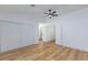Bedroom features wood floors, ceiling fan, and en-suite access at 2405 Pickwick Dr # 55, Henderson, NV 89014