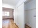 Hallway with closet laundry area and view to the bedroom window at 2405 Pickwick Dr # 55, Henderson, NV 89014