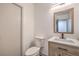 Modern bathroom features updated vanity with stylish mirror, contemporary sink, and toilet at 250 Shadybrook Ln # D, Las Vegas, NV 89107