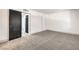 Neutral carpet, white walls, and a closet complements the layout of this bedroom at 250 Shadybrook Ln # D, Las Vegas, NV 89107