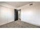 Bedroom featuring neutral carpet and a closet at 250 Shadybrook Ln # D, Las Vegas, NV 89107