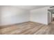 Spacious living room with wood flooring and natural light at 250 Shadybrook Ln # D, Las Vegas, NV 89107