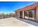 Spacious patio perfect for outdoor entertaining, featuring a sleek railing and beautiful clear sky views at 250 Shadybrook Ln # D, Las Vegas, NV 89107