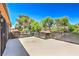 Large patio space featuring dark metal privacy screen, offering a private retreat with neighborhood views at 250 Shadybrook Ln # D, Las Vegas, NV 89107