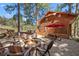 Beautiful backyard with fire pit, outdoor dining, and hot tub providing entertainment space and relaxation at 274 Ski Trail Rd, Mount Charleston, NV 89124