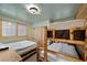 Bedroom featuring rustic bunk beds with twin bed and warm wooden trim at 274 Ski Trail Rd, Mount Charleston, NV 89124